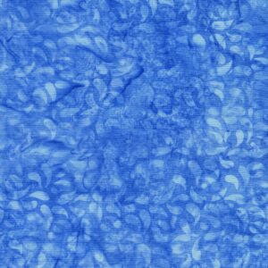 an image of blueish purple fabric with a pattern of tossed petals