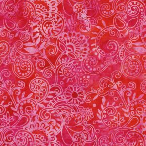 an image of pink and rose red fabric with a pattern of paisleys and swirls in lighter pink