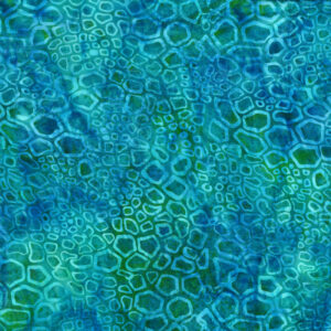 image of blue, green, and teal fabric printed with an abstract pattern of small irregular shapes