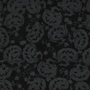 an image of black fabric with a pattern of tossed gray jack-o'-lanterns