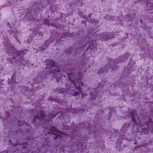 an image of purple fabric with a pattern of tossed bird silhouettes in darker purple
