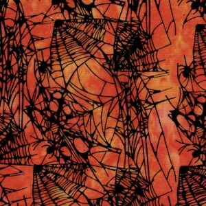 an image of orange fabric with a pattern of black spider webs and spiders