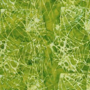 an image of lime green fabric with a pattern of light green spider webs and spiders