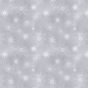 an image of gray fabric with a pattern of tossed white snowflakes