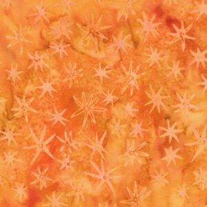 an image of orange batik fabric with a pattern of scattered sea star outlines in lighter orange