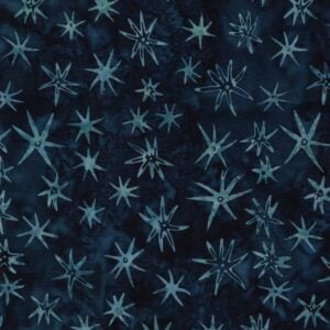 an image of dark blue batik fabric with a pattern of scattered sea star outlines in lighter blue