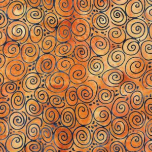 an image of orange gold batik fabric with a pattern of scattered blue spirals