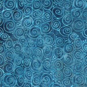 an image of blue batik fabric with a pattern of scattered lighter blue spirals