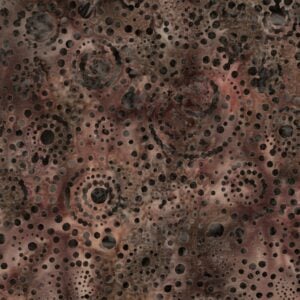 an image of brown and rust fabric with a pattern of swirls of darker brown dots.
