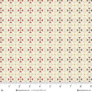 an image of off-white or cream fabric with a small geometric pattern in red, black and gold