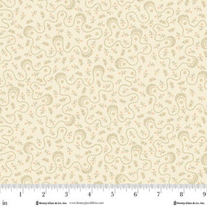 an image of off-white or cream fabric with a small geometric and floral pattern in peach and green
