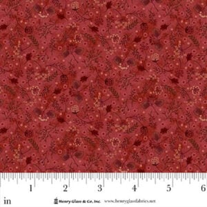 an image of soft red fabric with a small tonal floral print