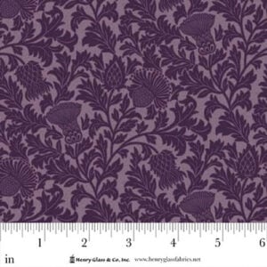 an image of dusty purple fabric with an all-over pattern of darker purple thistles
