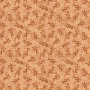 an image of light orange fabric with a pattern of small tossed bouquets