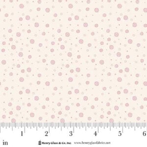 an image of off-white fabric with an all-over print of small light purple dots and circles