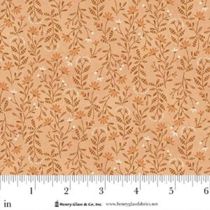 an image of light orange fabric with an all-over print of tossed flowers