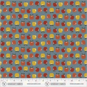 an image of blue fabric with a pattern of rows of small yellow, orange, and red apples
