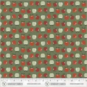 an image of green fabric with a pattern of rows of small light green, rust, and red apples