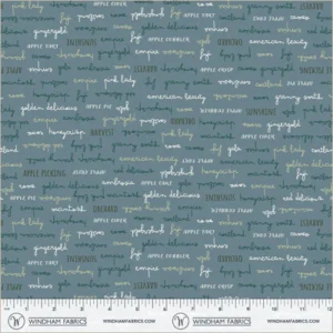 an image of blue fabric with a pattern of rows of apple-related words in blue, green, and white
