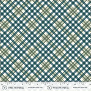an image of white fabric with a pattern of blue and green plaid that runs diagonally to the selvedge