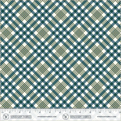 an image of white fabric with a pattern of blue and green plaid that runs diagonally to the selvedge