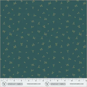 an image of blue-green fabric with a pattern of tossed small green leaves