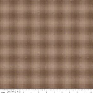 an image of brown fabric with a houndstooth pattern