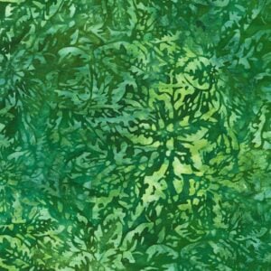 an image of green fabric with a pattern of tossed holly leaves in lighter green