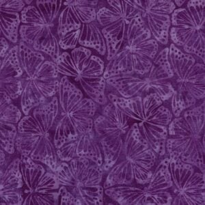 an image of purple batik fabric with an allover pattern of monarch butterflies