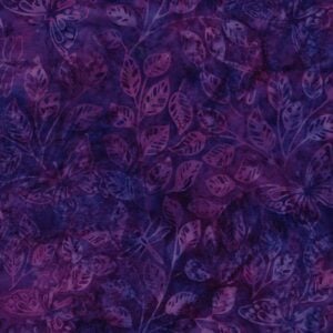 an image of purple batik fabric with an allover pattern of butterflies, dragonflies, and leaves