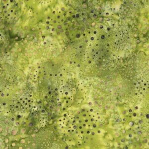 an image of lime green fabric with a pattern of swirls of darker green dots