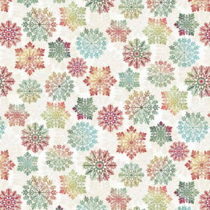 an image of white fabric with a pattern of tossed feathery snowflakes in bright colors