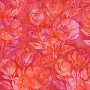 an image of orange and pink batik fabric with a pattern of poppies and leaves