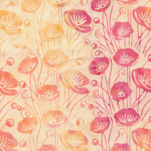 an image of variegated yellow batik fabric with a directional pattern of medium sized yellow and pink poppies