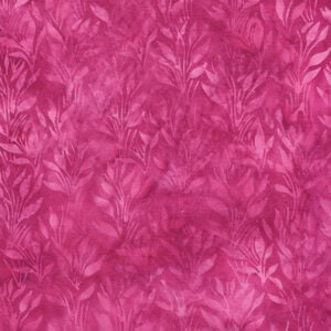 an image of magenta pink batik fabric with a tonal pattern of vines and leaves