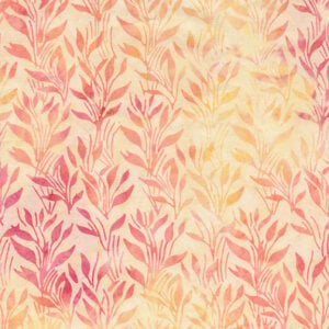 an image of yellow batik fabric with a pattern of pink and yellow vines and leaves