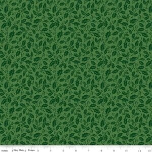 an image of green fabric with a pattern of small tossed holly sprigs