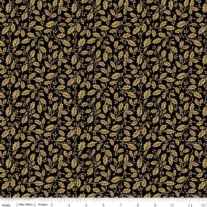 an image of black fabric with a pattern of small gold foil tossed holly sprigs