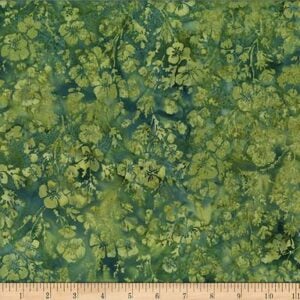 an image of a green tonal batik fabric with a flower and leaf pattern