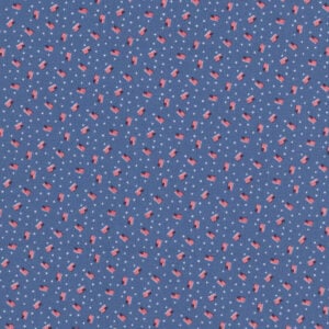 medium blue fabric with small scattered United States flags in red white and blue