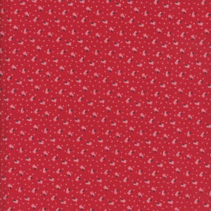 red fabric with small scattered United States flags in red white and blue