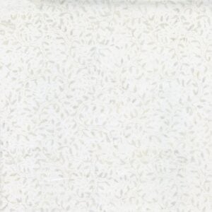 an image of white batik fabric with an allover pattern of delicate leaves and branches