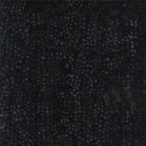 an image of black batik fabric with an allover print of small irregular shapes in greenish-black